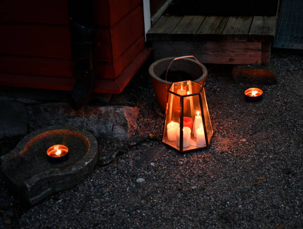 outdoor Christmas candles at the doorstep of a Finnish house stock photo