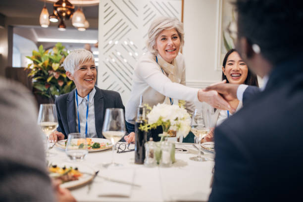 istock Business people in luxury restaurant 1441017701