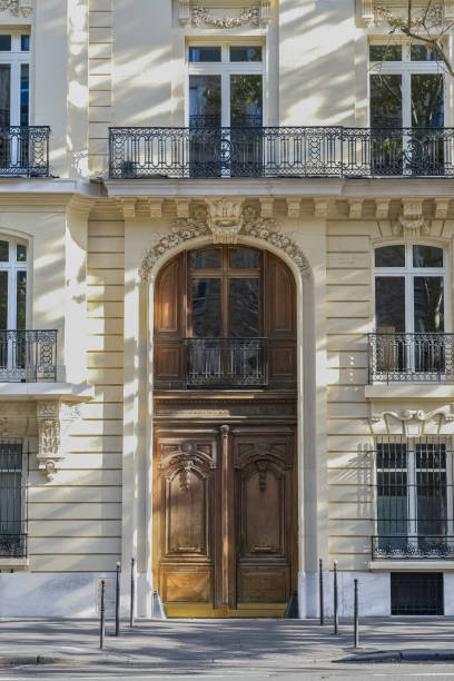 istock Paris, an ancient wooden door, beautiful facade 1441019806