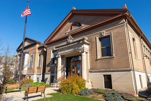 Edgerton, Wisconsin - United States - November 7th, 2022: Exterior of the Edgerton Public Library building, built in 1905, on a sunny Fall afternoon.