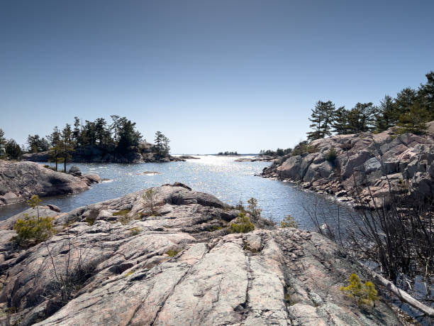 istock Sea and rock formations against clear sky 1441025212
