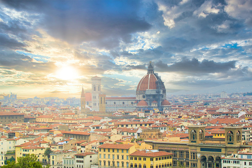 A skyline view of the Duomo Cathedral in Florence, Italy at Sunset