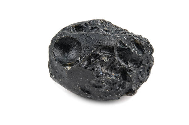 istock A piece of uncut black tektite with a rough surface 1441026626
