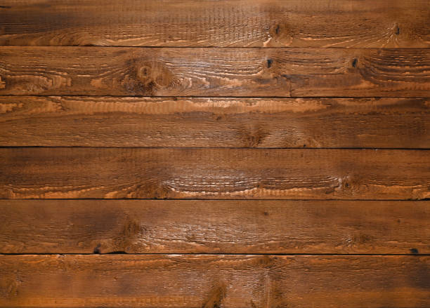 istock Wooden panel made of boards with a beautiful pattern, parquet texture. 1441027298