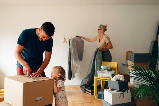 istock Cheerful Family Moving In New Home 1441038096