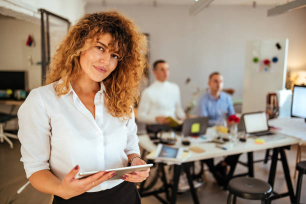istock Happy businesswoman using a digital tablet. 1441041666