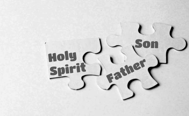 istock Puzzle Pieces with Father Son and Holy Spirit 1441044965