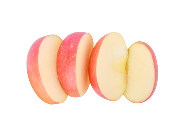 istock Slices of fresh red apple isolated on white 1441046205