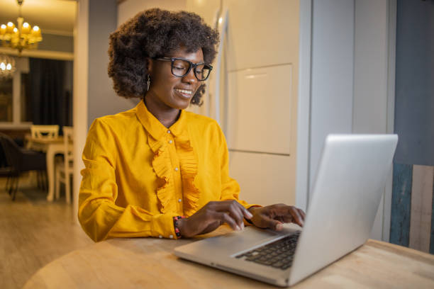 istock Young woman working from home 1441047431