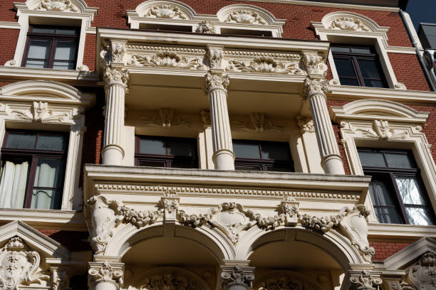 historicist facade with decorated balcony
