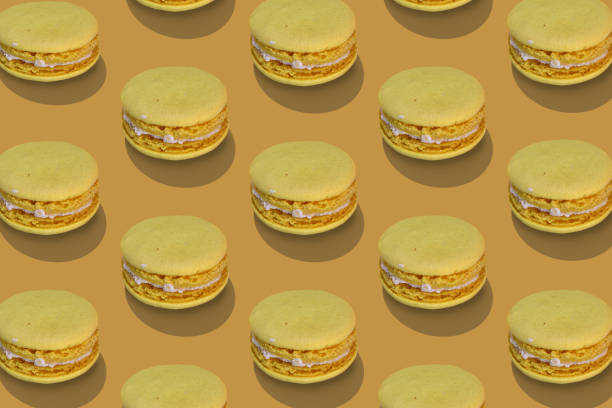 istock Isometric composition from traditional french macarons on yellow. 1441058779