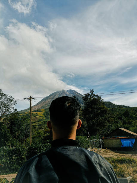 istock Me and the sinabung mountain view 1441063692