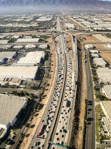 A view of the crowded 15 freeway near Ontario California from aboard a airplane