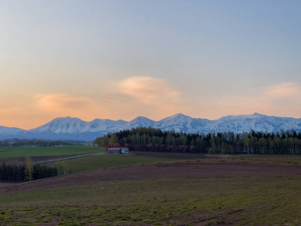 istock Evening field and Tokachi mountain range 1441067792