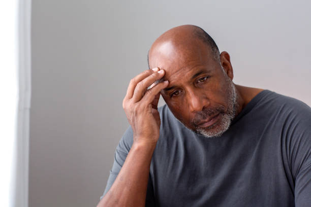 istock Older man not feeling well and having a headache. 1441068936