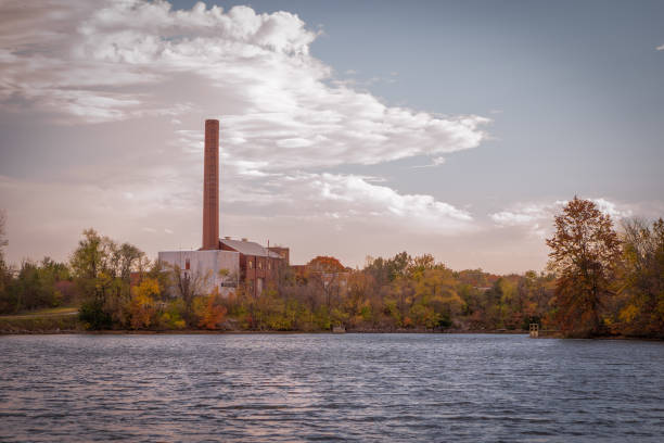 istock an old building with big tall chimney on the the lakeside 1441071414