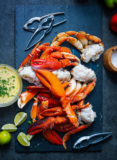 istock Top view of Lobster claws and Dungeness crab legs 1441072983