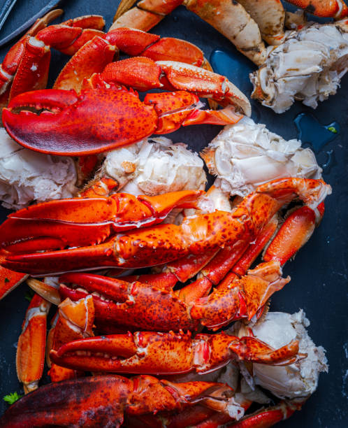 istock Lobster claws and Dungeness crab legs ready to eat 1441072995