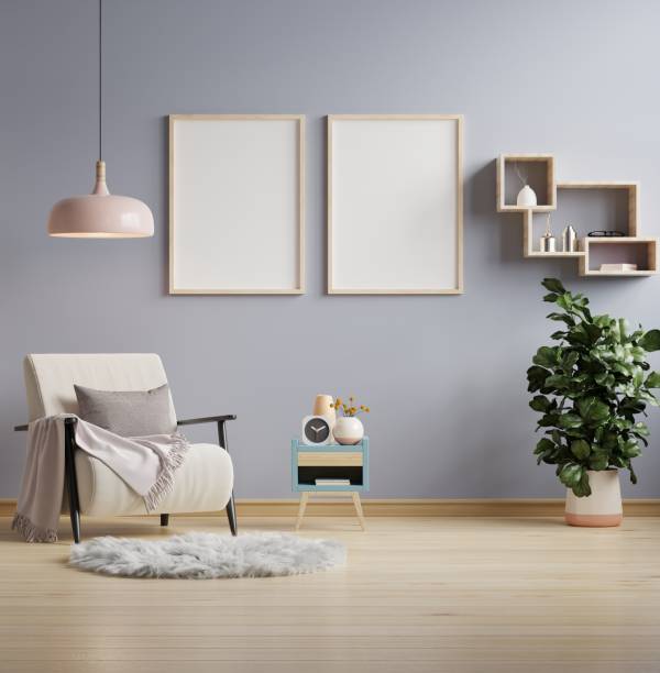 istock Poster mockup with vertical frames on empty dark wall in living room interior. 1441074004