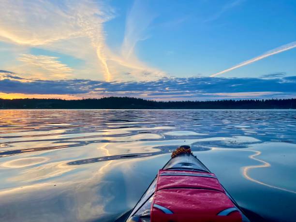istock Ocean Kayaking with a dynamic blue sky and orange sunset 1441083068