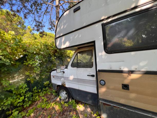 istock Camper oldtimer - scrap car on an campsite in Italy between Venice and Triest 1441095457