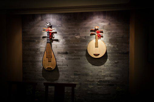 Asian musical instruments, pipa hanging on the wall