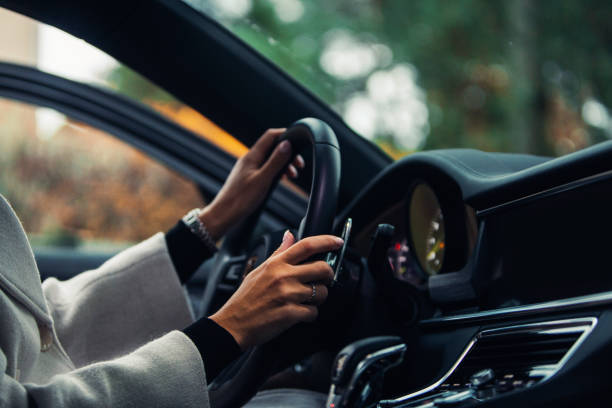 istock Woman hold a steering wheel 1441101986