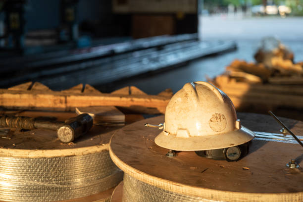 istock A safety working hardhat in factory place. 1441102069