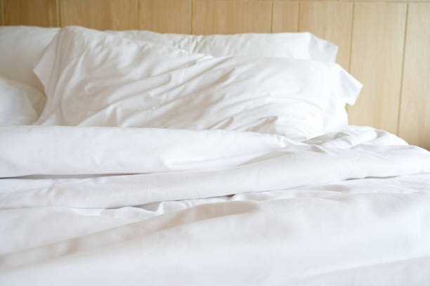istock white bed and pillows in the room 1441102555