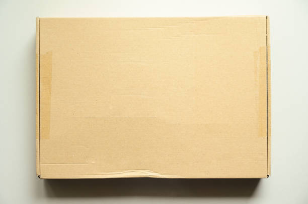istock brown box packaging for shipping, paper textured 1441102646