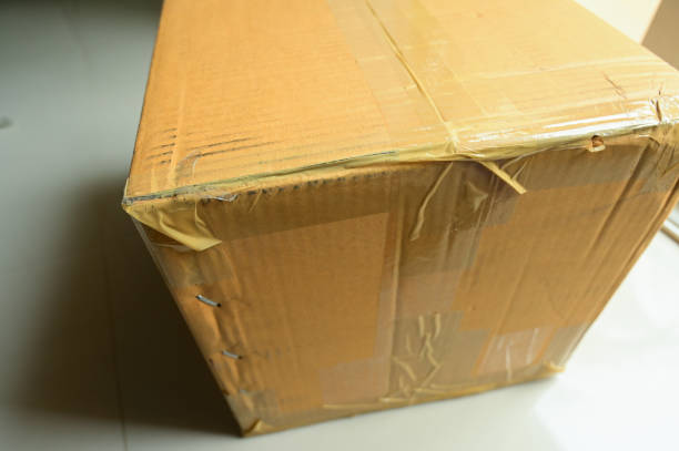 istock brown box packaging for shipping, paper textured 1441102663