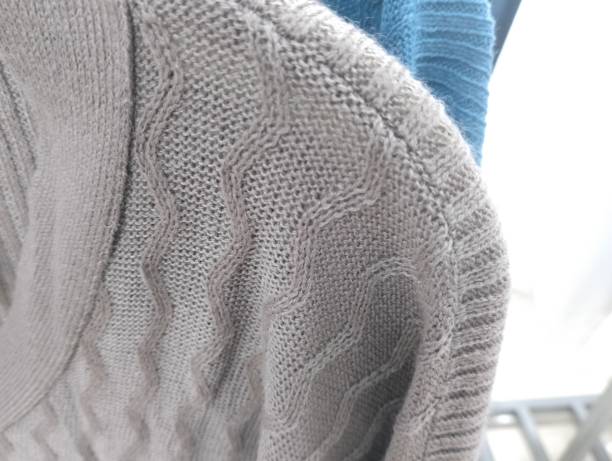 istock Gray brown clothes are being hung 1441106182