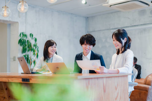 Young businessperson discussing in office