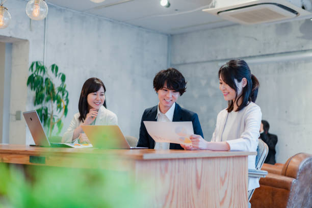 istock Young businessperson discussing in office 1441106228