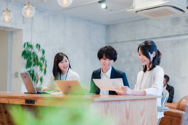 istock Young businessperson discussing in office 1441106236