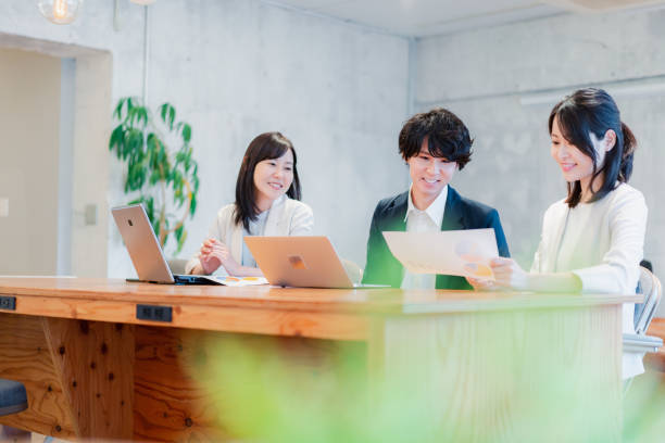 istock Young businessperson discussing in office 1441106257
