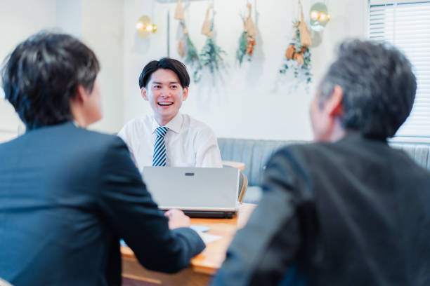 istock Businessman having a conversation in his office 1441108082