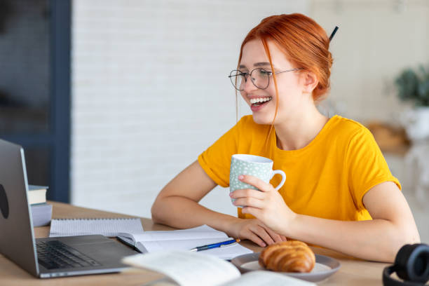istock Young woman office worker or freelancer have video conference with employees, talking, working remotely online at the office or at home 1441118806