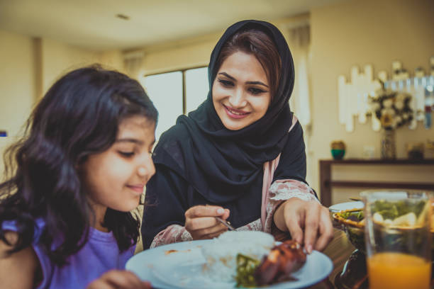 istock Arabian family at home 1441120166