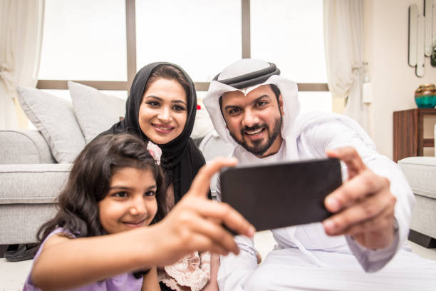 istock Arabian family at home 1441120595
