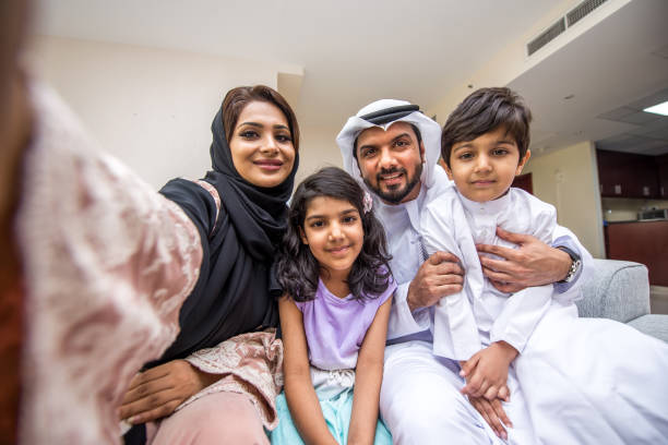 istock Arabian family at home 1441123363