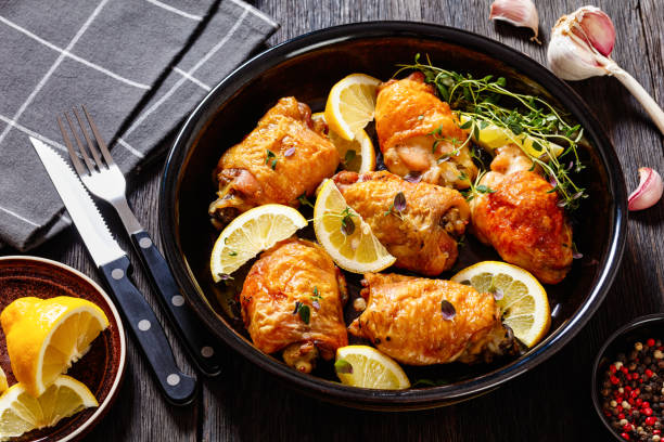 istock roast chicken thighs with lemon, thyme and spices 1441125416
