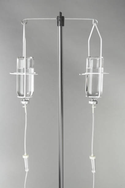 istock Drop counter with bottles of medicine on grey background 1441125583