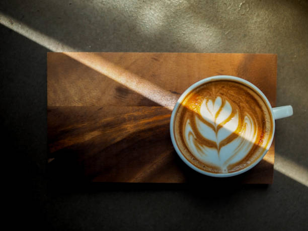 istock Beautiful hot latte with flower art on top 1441126625