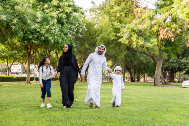 istock Happy arabian family in a park 1441126907