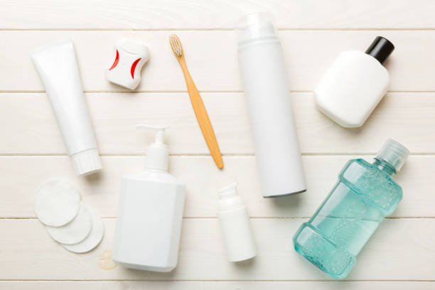 istock Mockup for bathing products top view flat lay, spa razor, toothpaste, soap, gel and other various accessories. Cosmetics for skin health. Bath Mockup for your logo 1441127708