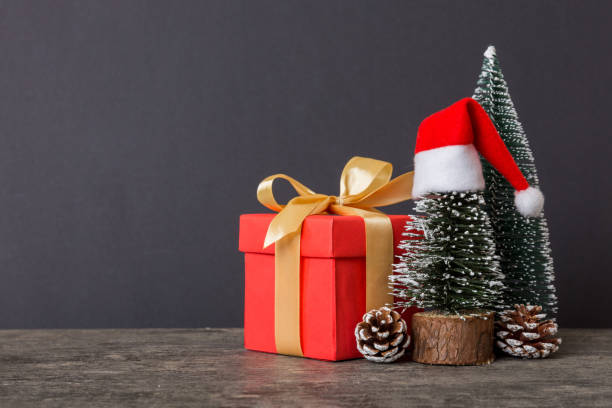 istock Christmas composition. craft Gift box, small tree, branches and craft DIY decorations on white background. New year concept. Christmas home decoration Flat lay, top view, copy space 1441127743
