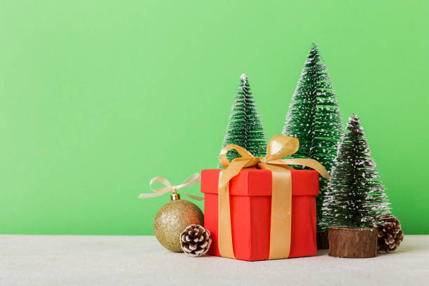 istock Christmas composition. craft Gift box, small tree, branches and craft DIY decorations on white background. New year concept. Christmas home decoration Flat lay, top view, copy space 1441127757
