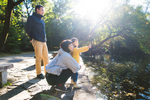istock Japanese family in a park 1441131334