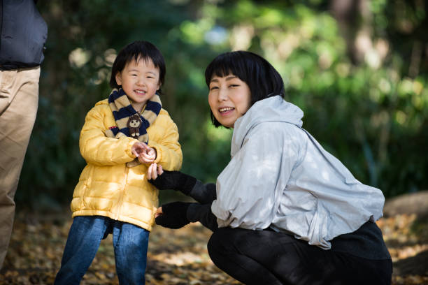 istock Japanese family in a park 1441131787